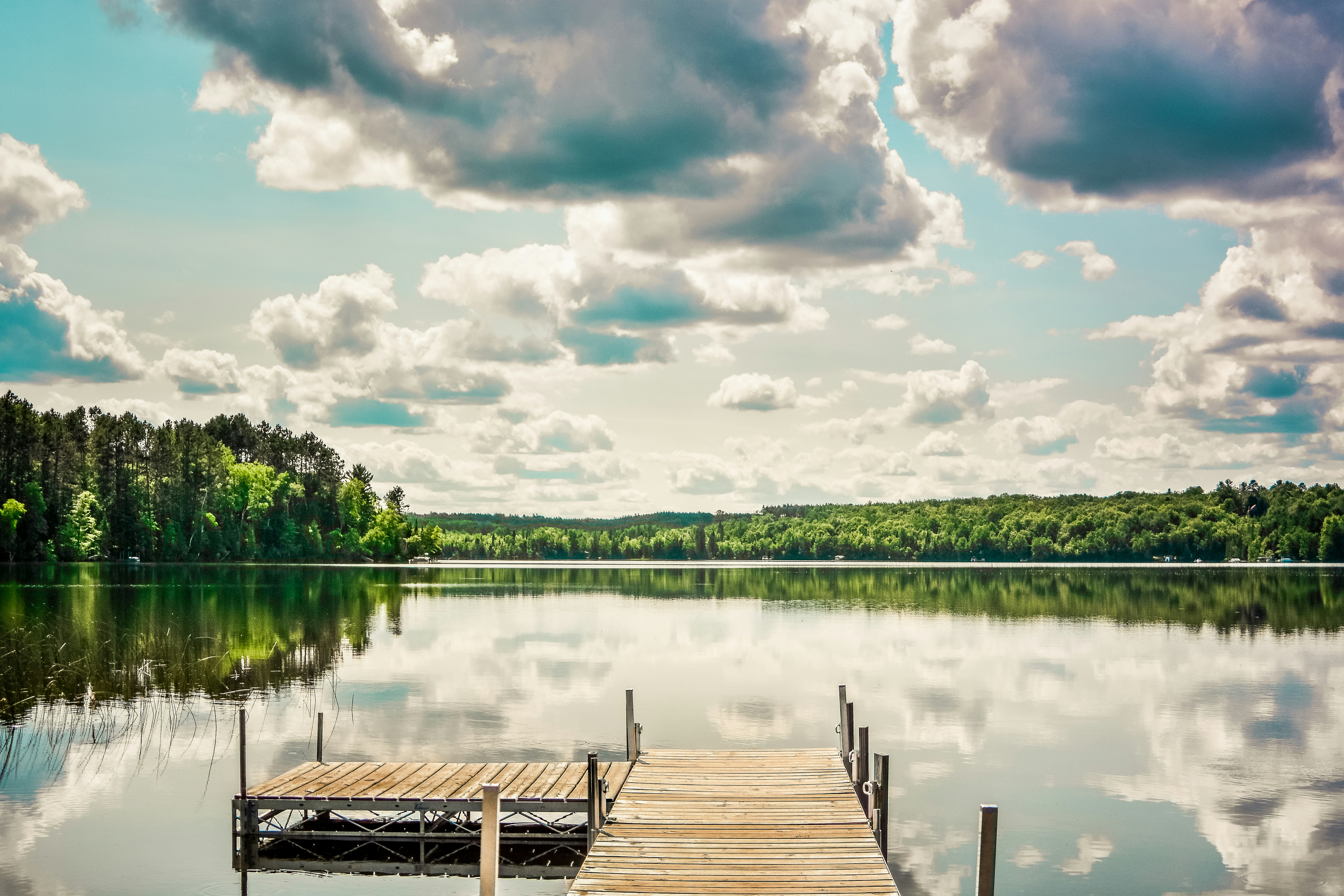 landscape photography of lake dock